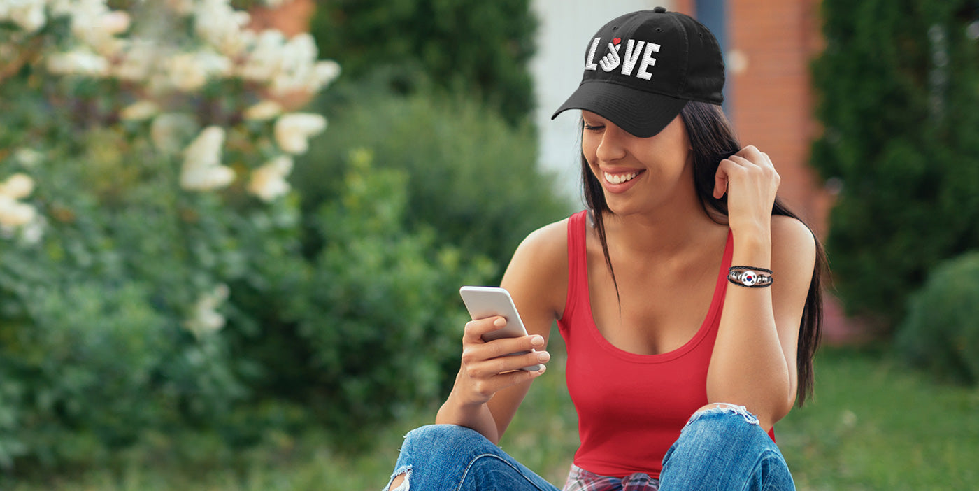 Girl wearing Korean Flag Bracelet and Love Finger Heart Cap