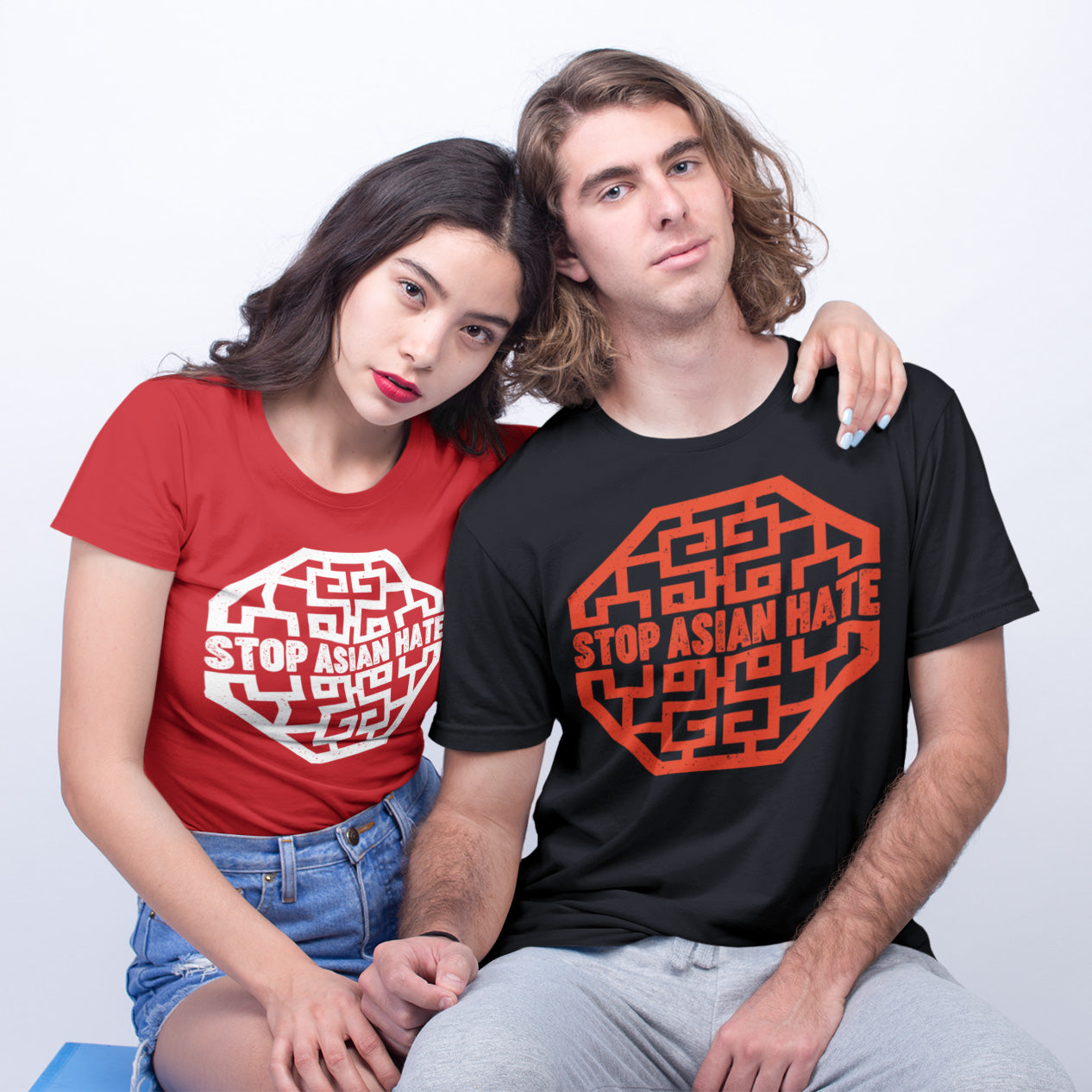 Couple wearing Stop Asian Hate T-shirts